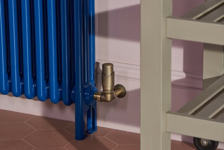 Tall kitchen radiator in powder coated steel with brass thermostatic radiator valve